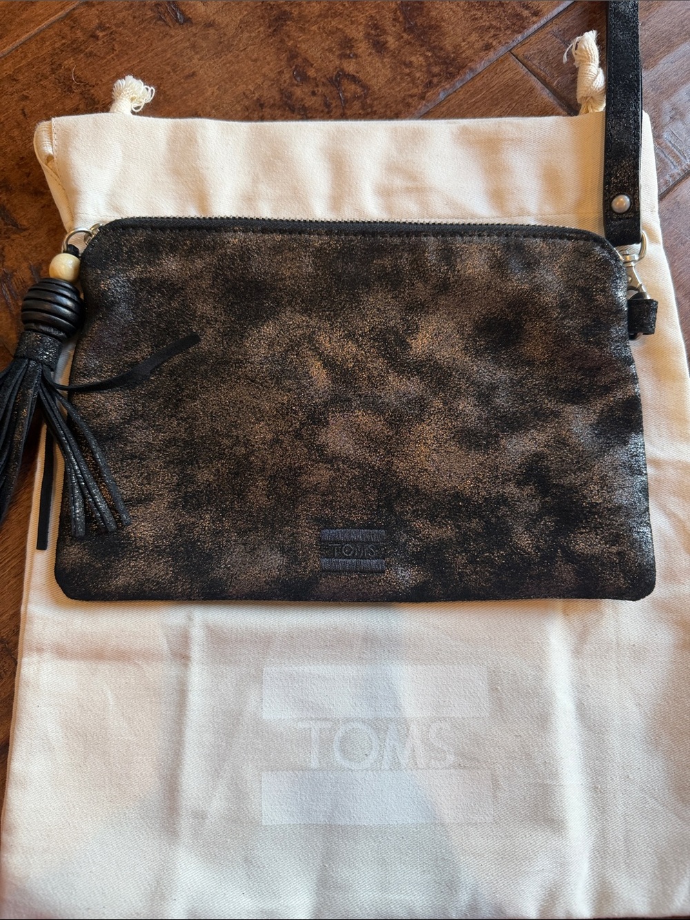 TOMS Black Metallic Wristlet Clutch with Tassel